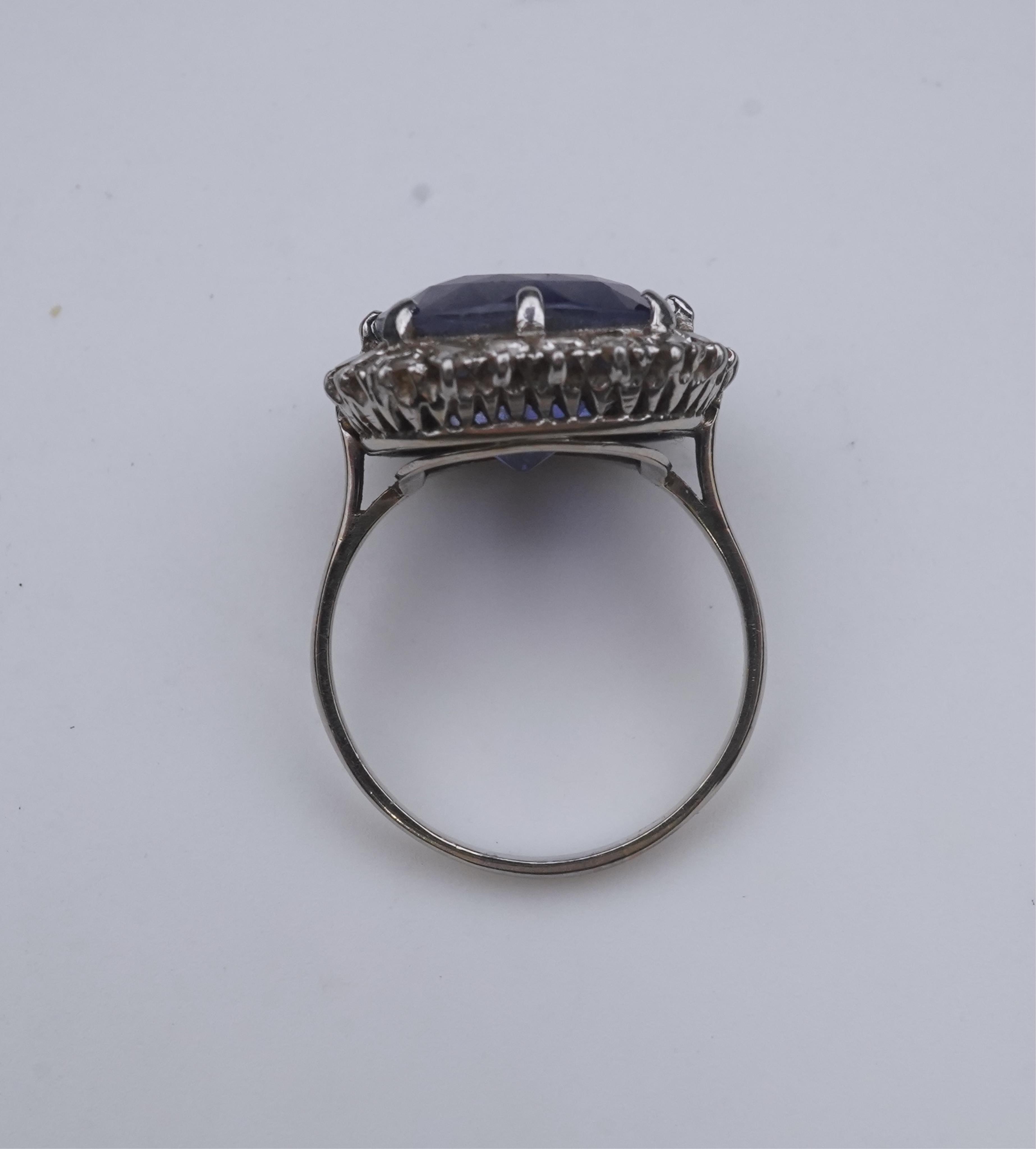 A synthetic sapphire and diamond cluster ring, early 20th century